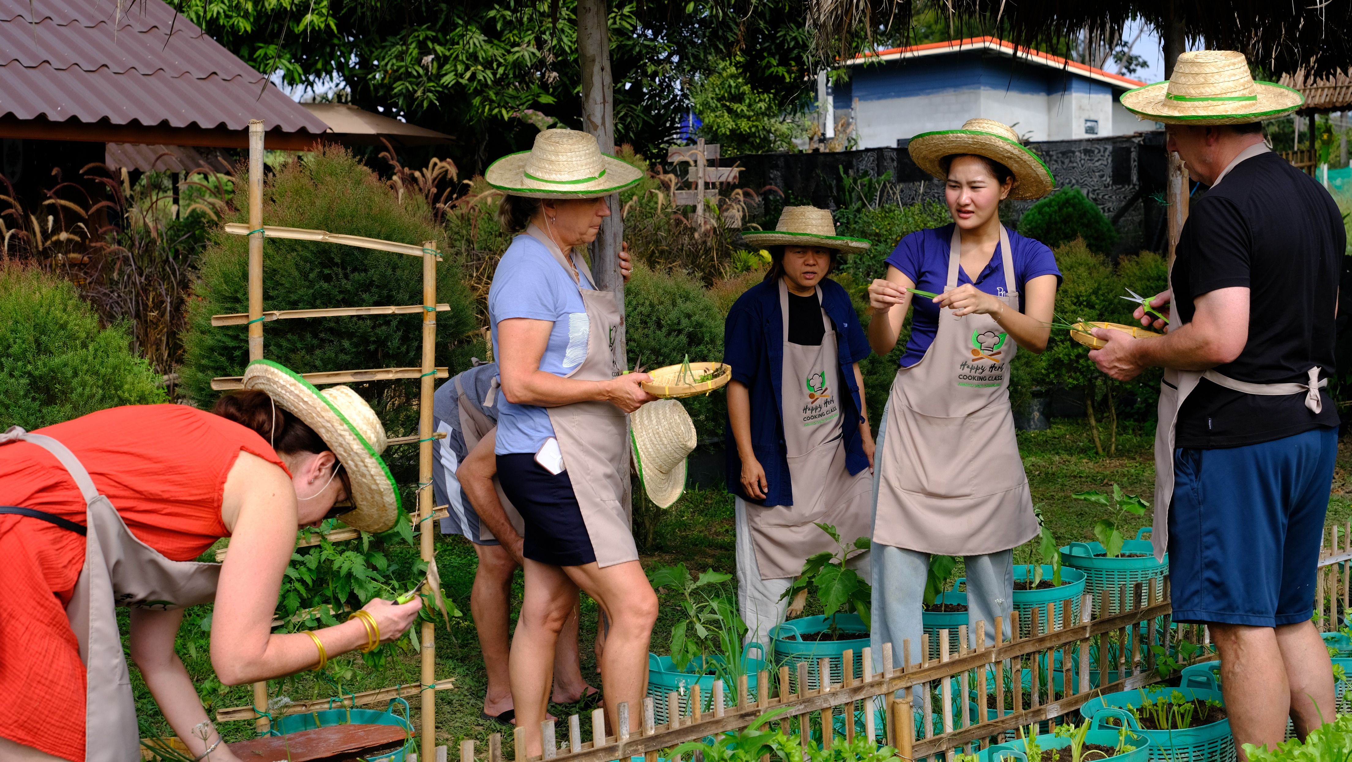 Open-air outdoor kitchen at the Happy Herb Thai Cooking Class in Chiang Mai